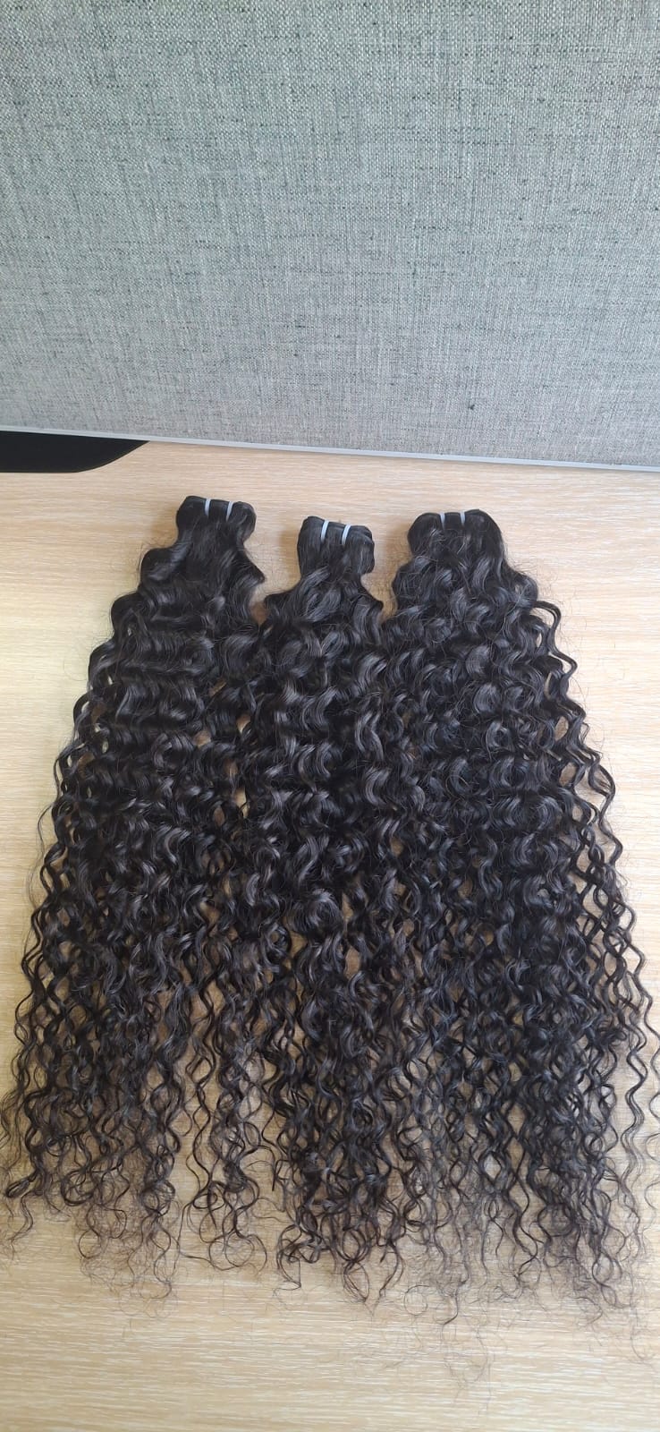 Loose curl wefts